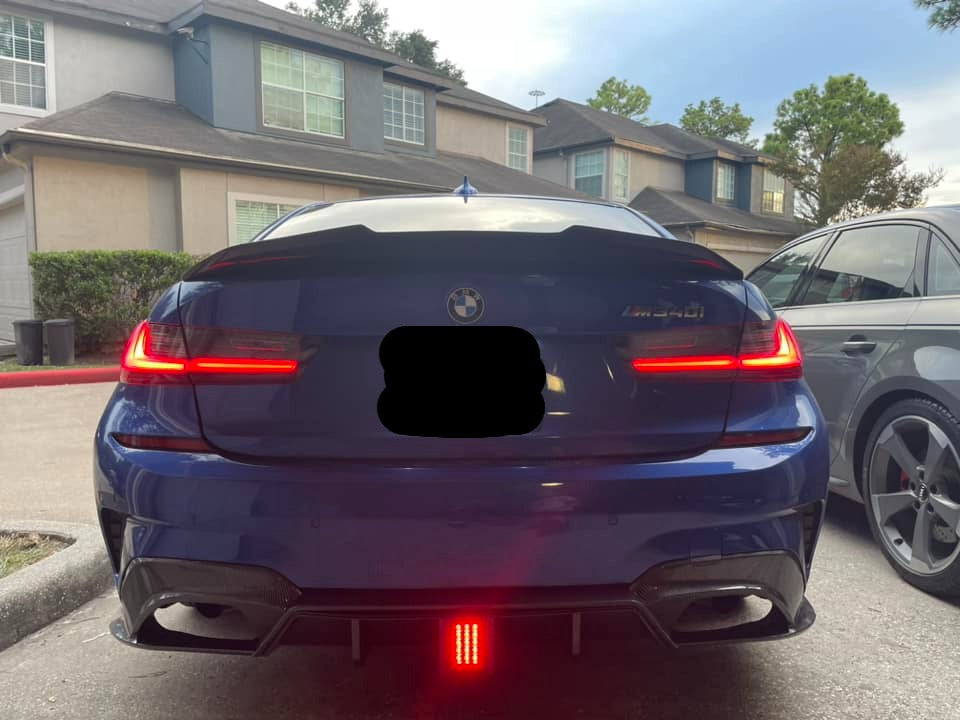 https://www.thecarbonindustries.com › products › abs-m-performance-rear-diffuser-w-brake-light-for-bmw-3-series-g20-g21-330i-m340i