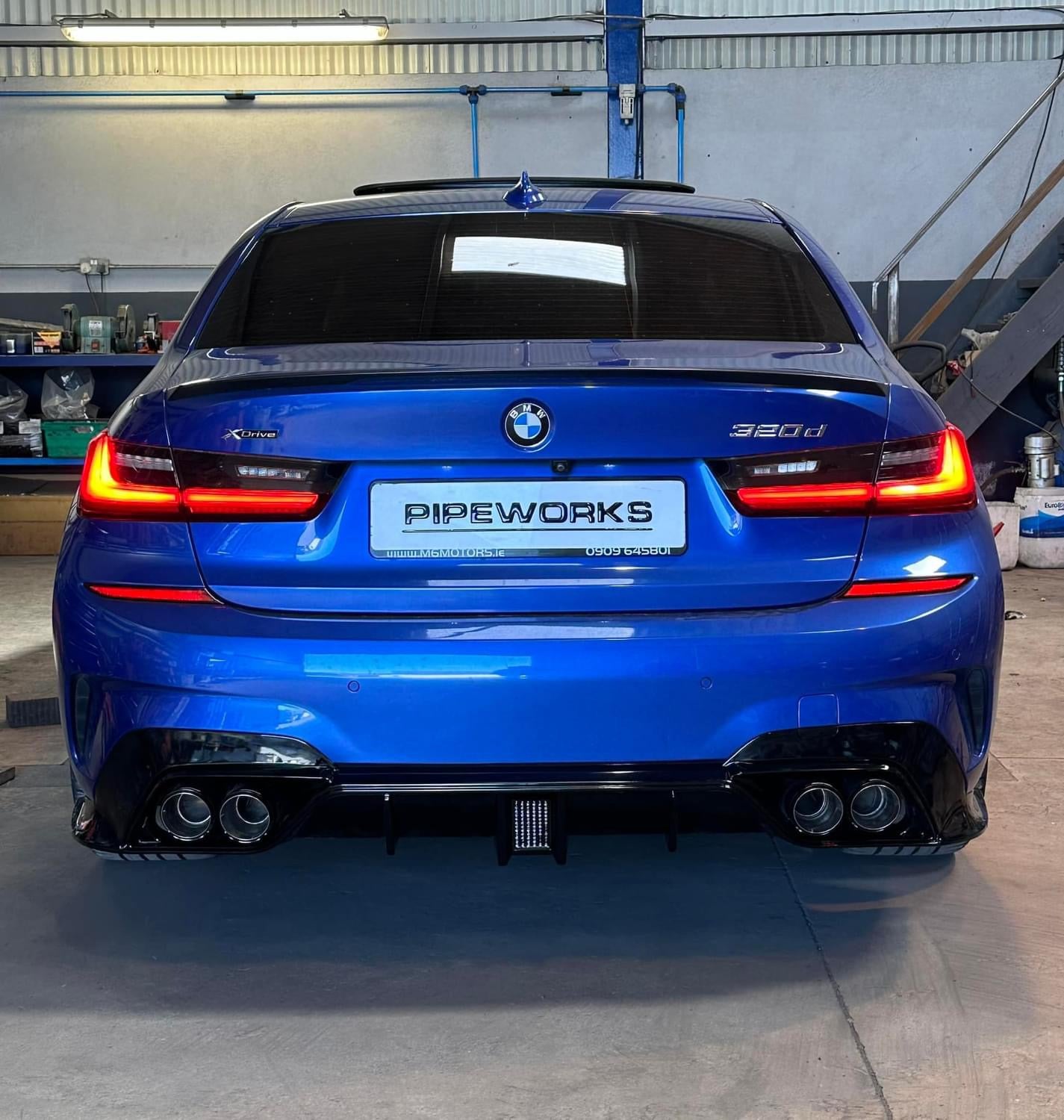 https://www.thecarbonindustries.com › products › abs-m-performance-rear-diffuser-w-brake-light-for-bmw-3-series-g20-g21-330i-m340i