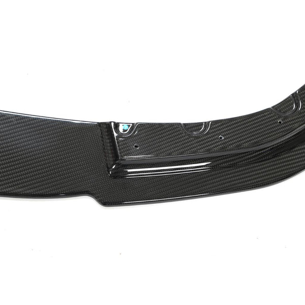 https://www.thecarbonindustries.com › products › ac-style-carbon-fiber-front-lip-bmw-f91-f92-f93-m8