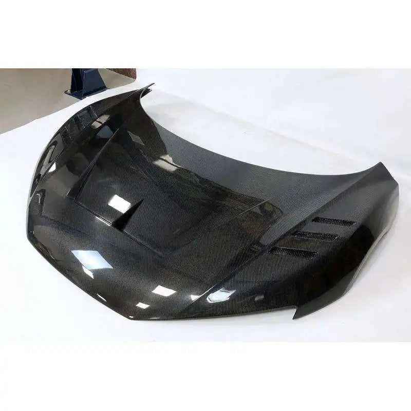 https://www.thecarbonindustries.com › products › 1016-style-carbon-fiber-vented-hood-audi-r8