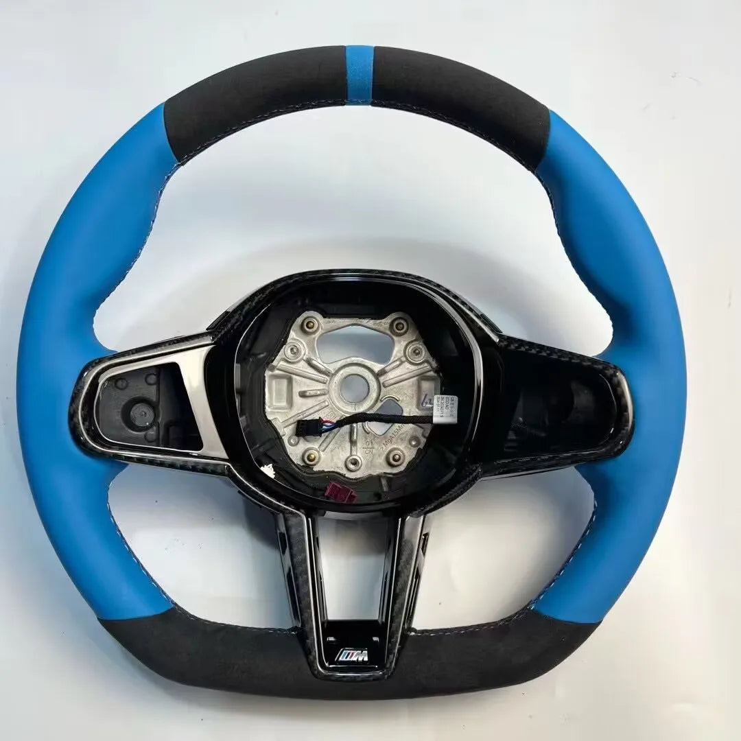 https://www.thecarbonindustries.com › products › 2025-lci-steering-wheel-w-carbon-fiber-trim-bmw-g-chassis