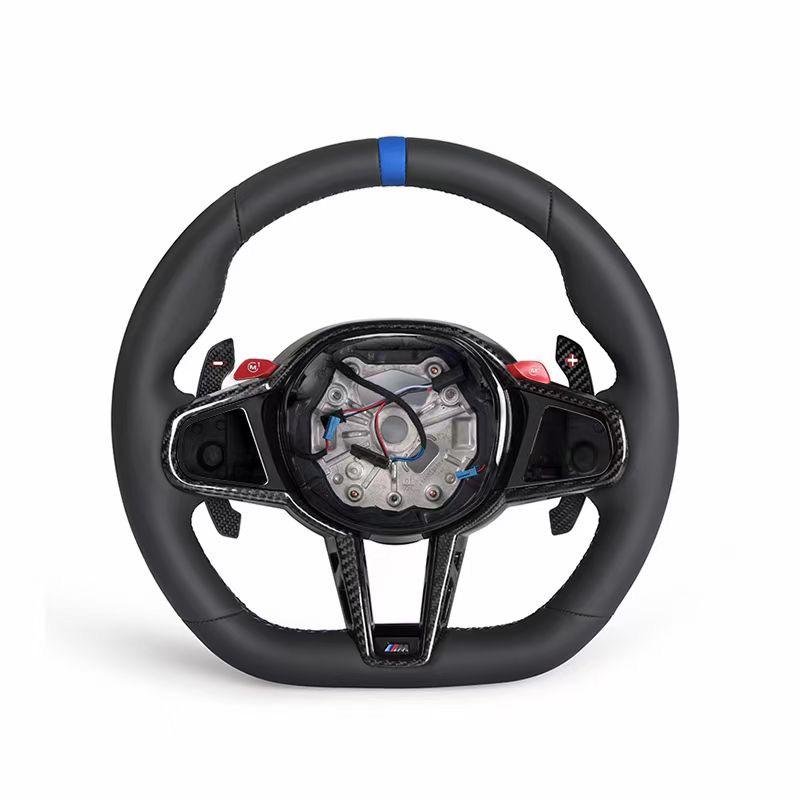https://www.thecarbonindustries.com › products › 2025-lci-steering-wheel-w-carbon-fiber-trim-bmw-g-chassis
