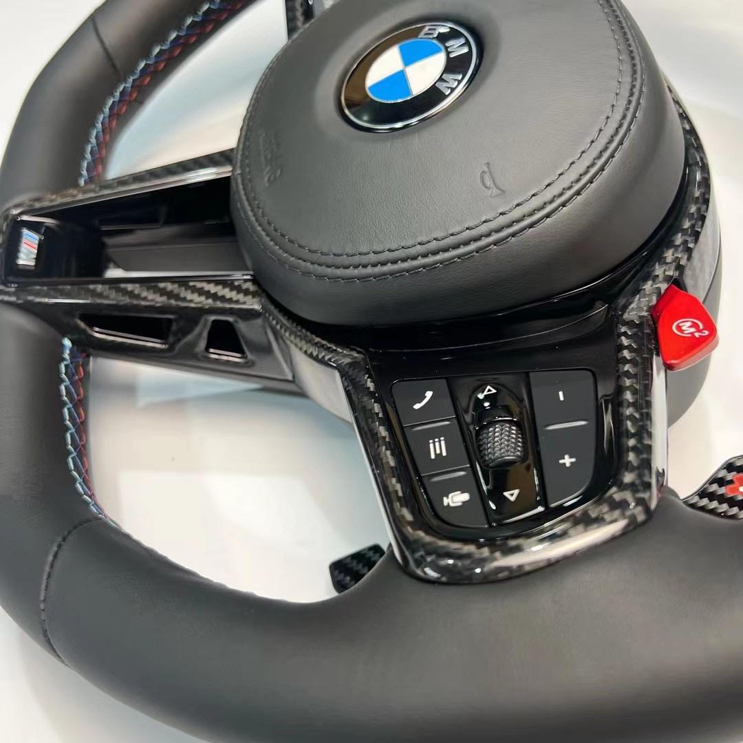 https://www.thecarbonindustries.com › products › 2025-lci-steering-wheel-w-carbon-fiber-trim-bmw-g-chassis