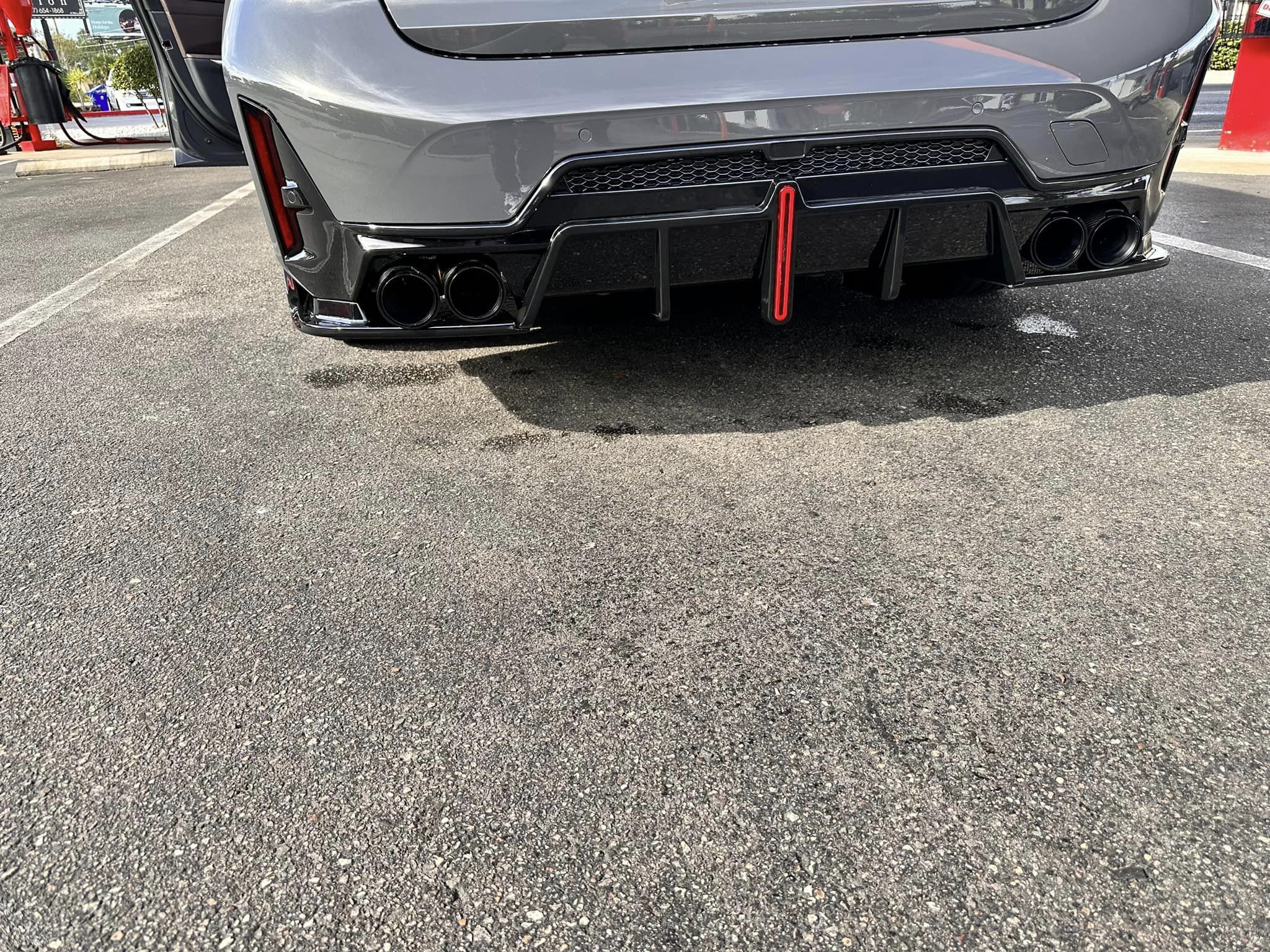 https://www.thecarbonindustries.com › products › abs-gloss-black-diffuser-bmw-g20-3-series-lci

