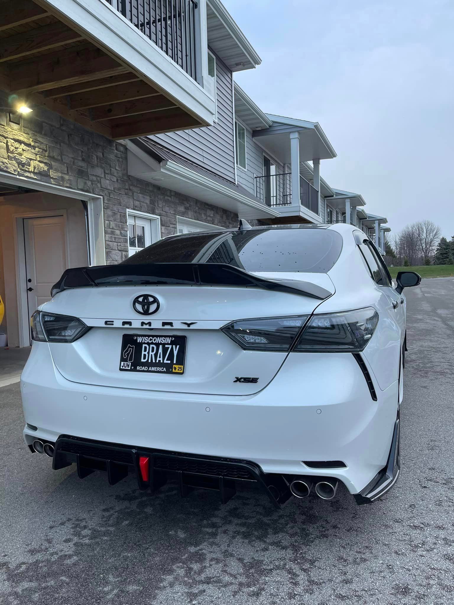 https://www.thecarbonindustries.com › products › abs-gloss-black-front-lip-rear-diffuser-w-led-toyota-camry

