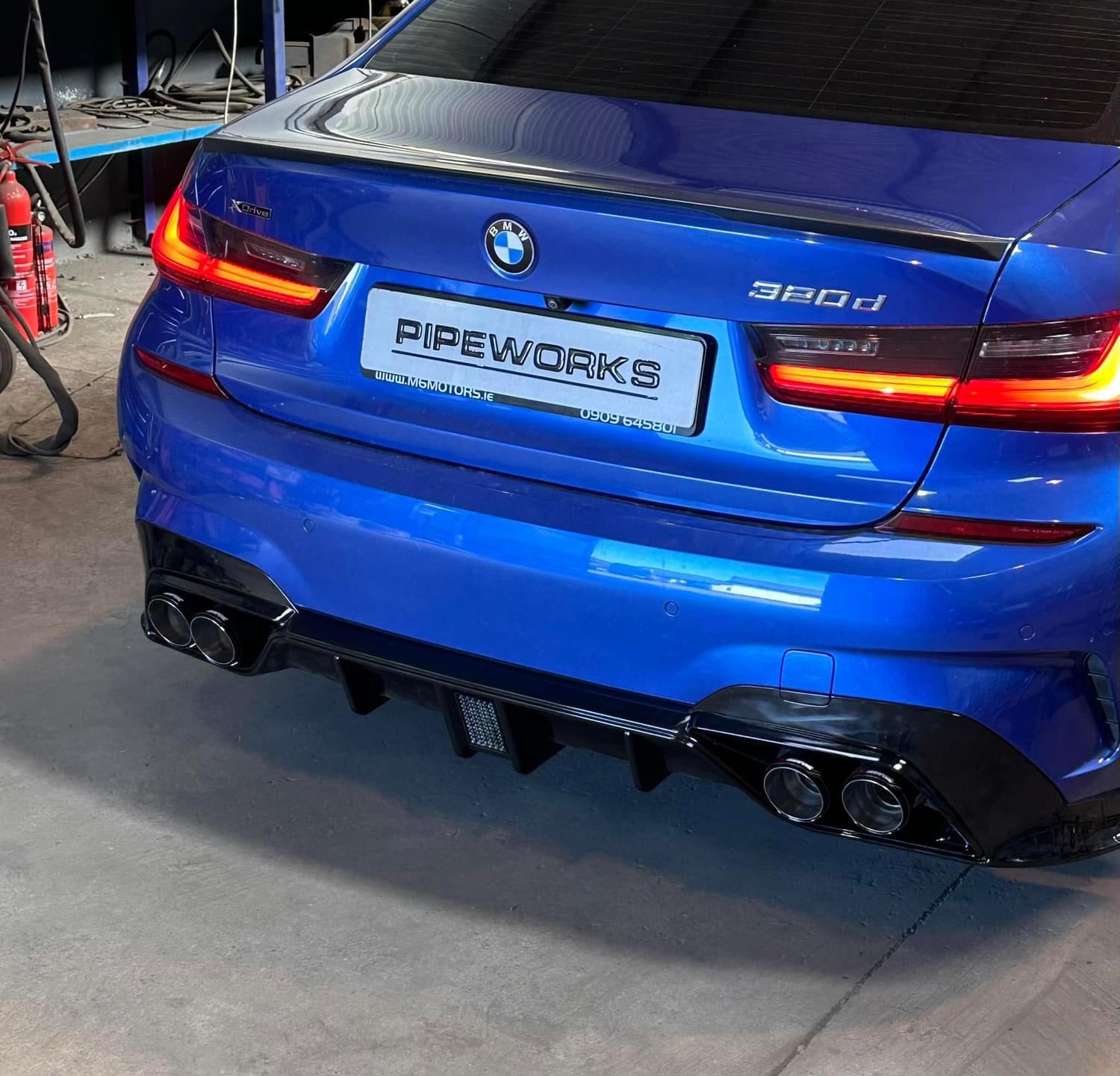 https://www.thecarbonindustries.com › products › abs-m-performance-rear-diffuser-w-brake-light-for-bmw-3-series-g20-g21-330i-m340i

