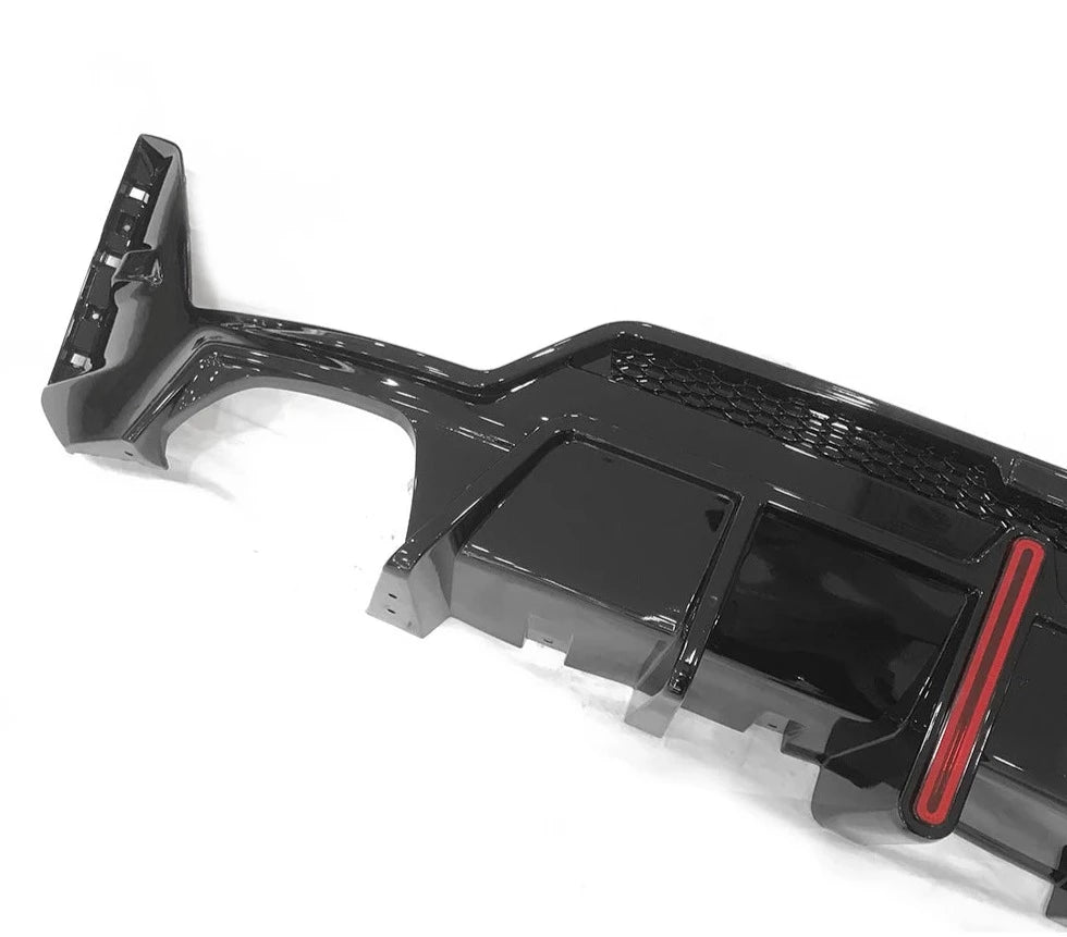https://www.thecarbonindustries.com › products › abs-gloss-black-diffuser-bmw-g20-3-series-lci

