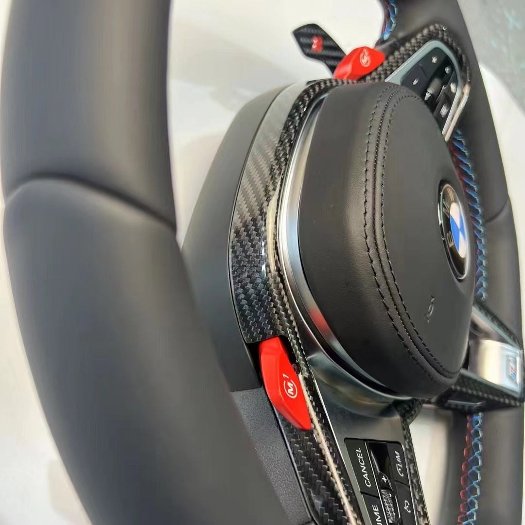 https://www.thecarbonindustries.com › products › 2025-lci-steering-wheel-w-carbon-fiber-trim-bmw-g-chassis

